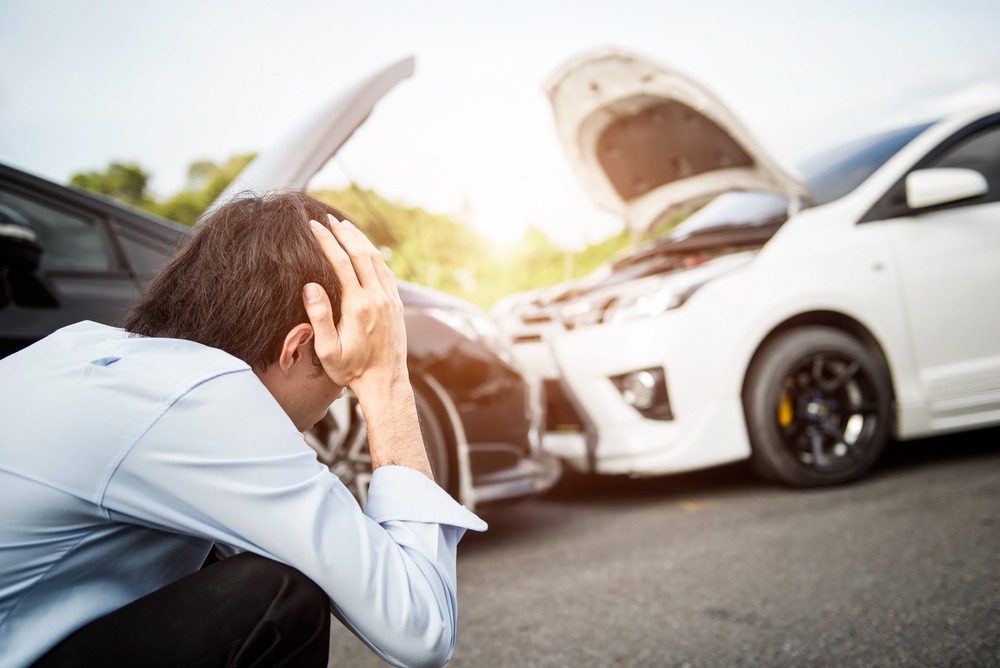 Man Stressing Over A Car Accident