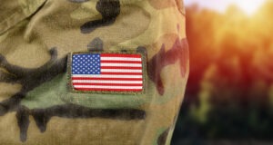 close-up on flag patch on soldier’s arm
