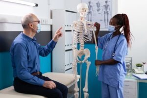 nurse working with spinal patient