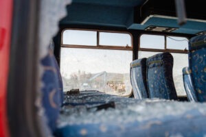 view through a broken bus window