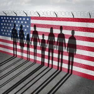 shadow of a family against an american flag
