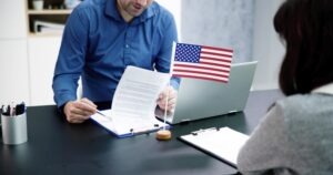 immigration lawyer working with client